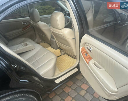 Черный Ниссан Максима, объемом двигателя 3 л и пробегом 323 тыс. км за 5799 $, фото 30 на Automoto.ua