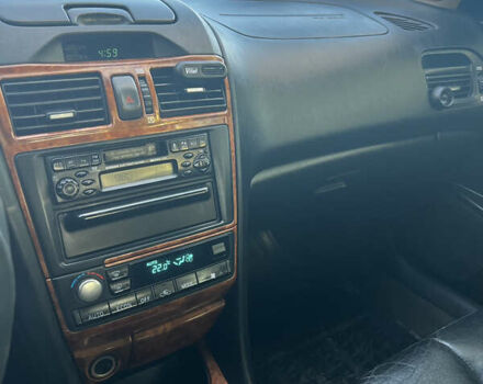 Черный Ниссан Максима, объемом двигателя 2 л и пробегом 300 тыс. км за 3300 $, фото 25 на Automoto.ua