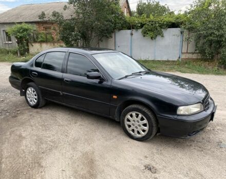 Черный Ниссан Максима, объемом двигателя 2 л и пробегом 200 тыс. км за 2550 $, фото 1 на Automoto.ua