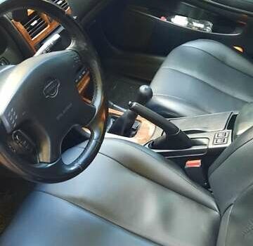 Черный Ниссан Максима, объемом двигателя 2 л и пробегом 335 тыс. км за 3300 $, фото 4 на Automoto.ua