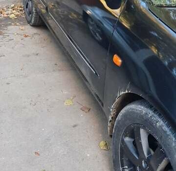 Черный Ниссан Максима, объемом двигателя 2 л и пробегом 335 тыс. км за 3300 $, фото 6 на Automoto.ua