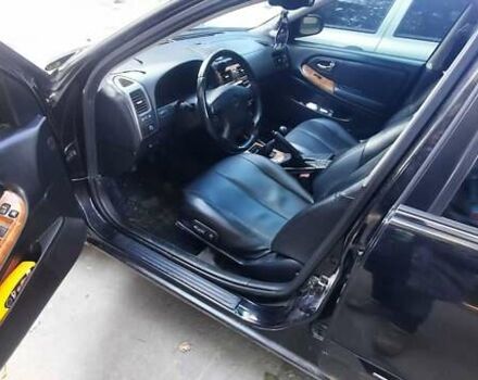 Черный Ниссан Максима, объемом двигателя 2 л и пробегом 335 тыс. км за 3300 $, фото 2 на Automoto.ua