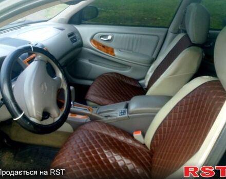 Ніссан Максіма 2004 у Харкові на Automoto.ua Чорний Ніссан Максіма, об'ємом двигуна 2 л та пробігом 233 тис. км за 3550 $, фото 4 на Automoto.ua