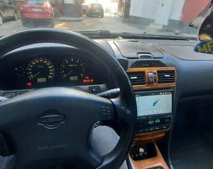 Черный Ниссан Максима, объемом двигателя 2 л и пробегом 335 тыс. км за 3300 $, фото 9 на Automoto.ua