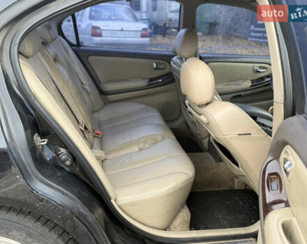 Чорний Ніссан Максіма, об'ємом двигуна 2 л та пробігом 342 тис. км за 2500 $, фото 5 на Automoto.ua