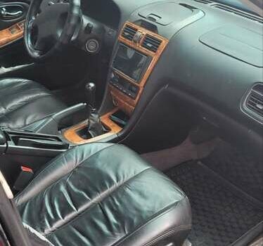 Черный Ниссан Максима, объемом двигателя 2 л и пробегом 300 тыс. км за 3800 $, фото 10 на Automoto.ua