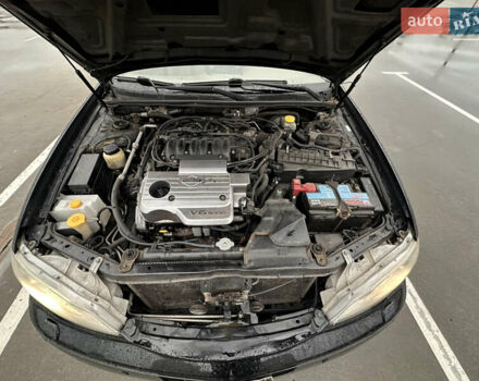 Черный Ниссан Максима, объемом двигателя 3 л и пробегом 465 тыс. км за 5000 $, фото 46 на Automoto.ua