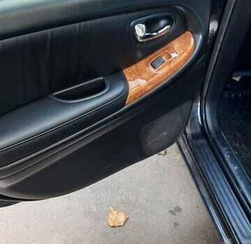 Черный Ниссан Максима, объемом двигателя 2 л и пробегом 335 тыс. км за 3300 $, фото 5 на Automoto.ua