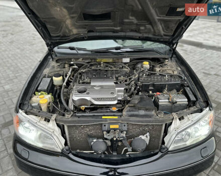 Черный Ниссан Максима, объемом двигателя 2 л и пробегом 221 тыс. км за 4800 $, фото 25 на Automoto.ua