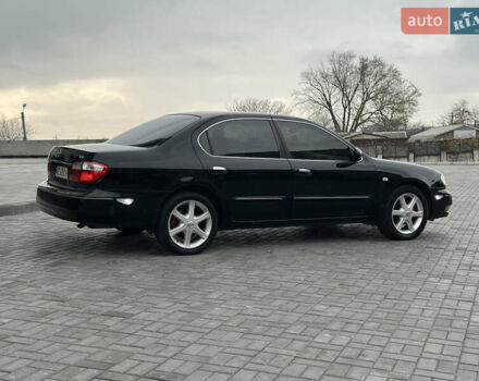 Черный Ниссан Максима, объемом двигателя 2 л и пробегом 221 тыс. км за 4800 $, фото 1 на Automoto.ua