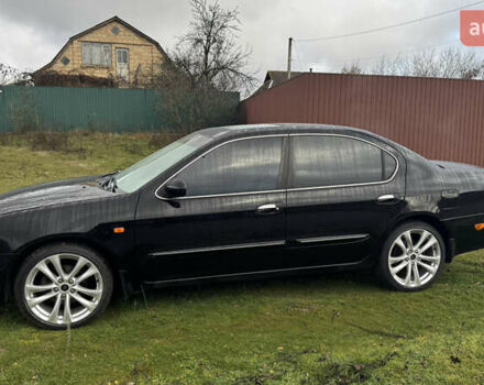 Черный Ниссан Максима, объемом двигателя 2.99 л и пробегом 340 тыс. км за 3999 $, фото 7 на Automoto.ua