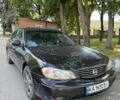 Чорний Ніссан Максіма, об'ємом двигуна 2 л та пробігом 375 тис. км за 2250 $, фото 1 на Automoto.ua