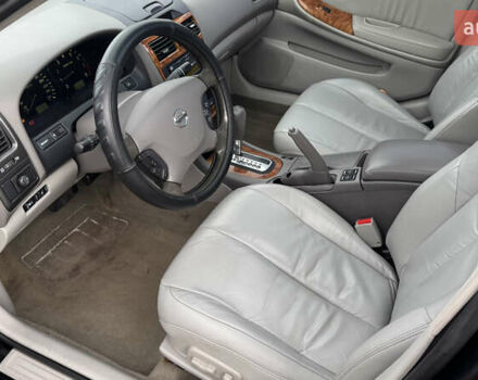 Черный Ниссан Максима, объемом двигателя 2.99 л и пробегом 340 тыс. км за 3999 $, фото 9 на Automoto.ua