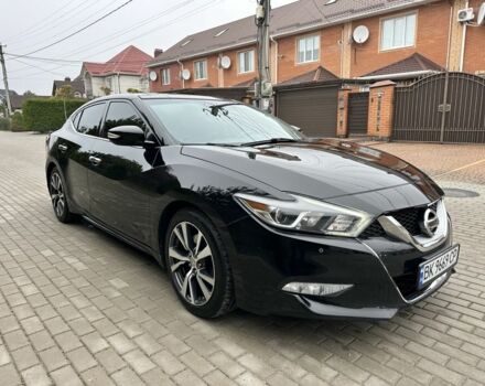 Черный Ниссан Максима, объемом двигателя 3.5 л и пробегом 100 тыс. км за 15700 $, фото 1 на Automoto.ua