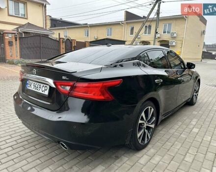 Черный Ниссан Максима, объемом двигателя 3.5 л и пробегом 107 тыс. км за 16900 $, фото 1 на Automoto.ua