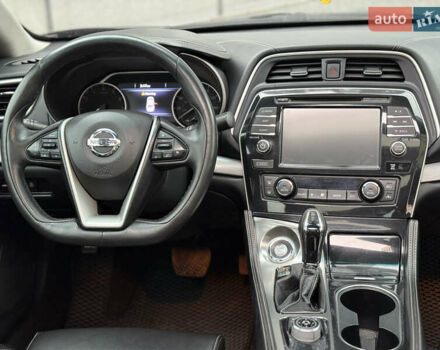 Черный Ниссан Максима, объемом двигателя 3.5 л и пробегом 102 тыс. км за 14900 $, фото 32 на Automoto.ua