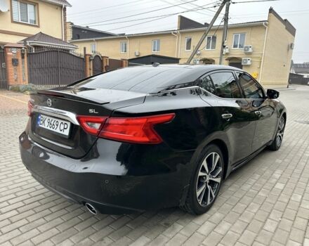 Черный Ниссан Максима, объемом двигателя 3.5 л и пробегом 100 тыс. км за 15700 $, фото 2 на Automoto.ua