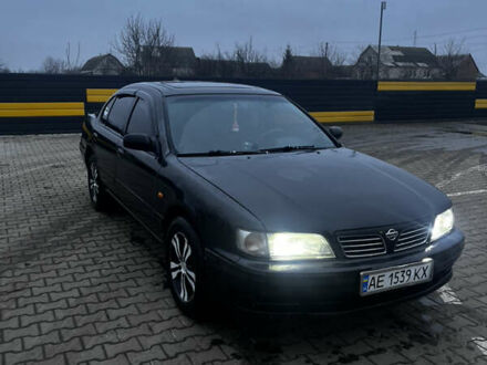 Черный Ниссан Максима, объемом двигателя 2 л и пробегом 450 тыс. км за 2250 $, фото 1 на Automoto.ua