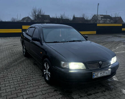 Черный Ниссан Максима, объемом двигателя 2 л и пробегом 450 тыс. км за 2250 $, фото 1 на Automoto.ua