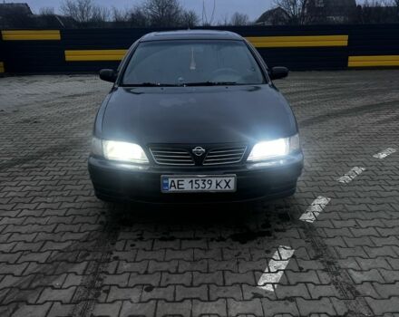 Черный Ниссан Максима, объемом двигателя 2 л и пробегом 450 тыс. км за 2250 $, фото 1 на Automoto.ua
