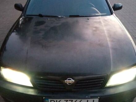 Черный Ниссан Максима, объемом двигателя 2 л и пробегом 290 тыс. км за 1750 $, фото 1 на Automoto.ua