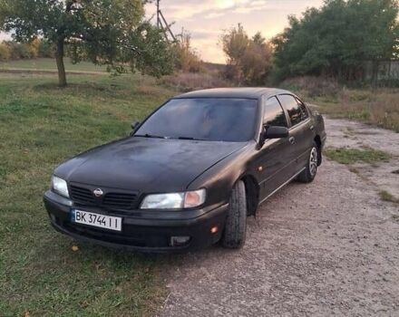 Чорний Ніссан Максіма, об'ємом двигуна 2 л та пробігом 290 тис. км за 1500 $, фото 1 на Automoto.ua