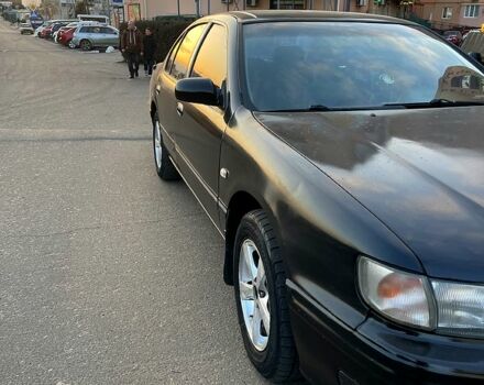 Черный Ниссан Максима, объемом двигателя 2 л и пробегом 2 тыс. км за 2000 $, фото 1 на Automoto.ua