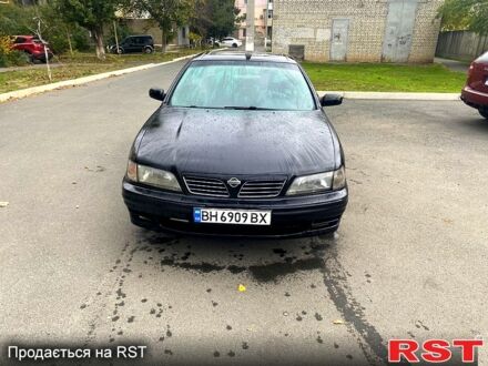 Черный Ниссан Максима, объемом двигателя 3 л и пробегом 350 тыс. км за 2100 $, фото 1 на Automoto.ua