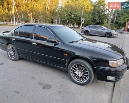 Черный Ниссан Максима, объемом двигателя 3 л и пробегом 403 тыс. км за 2500 $, фото 1 на Automoto.ua