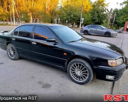 Черный Ниссан Максима, объемом двигателя 3 л и пробегом 403 тыс. км за 2500 $, фото 1 на Automoto.ua