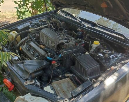 Чорний Ніссан Максіма, об'ємом двигуна 2 л та пробігом 416 тис. км за 1800 $, фото 1 на Automoto.ua