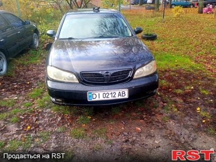 Чорний Ніссан Максіма, об'ємом двигуна 3 л та пробігом 345 тис. км за 3500 $, фото 1 на Automoto.ua