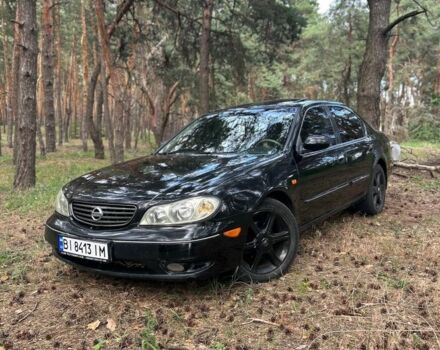 Черный Ниссан Максима, объемом двигателя 2 л и пробегом 250 тыс. км за 4700 $, фото 1 на Automoto.ua