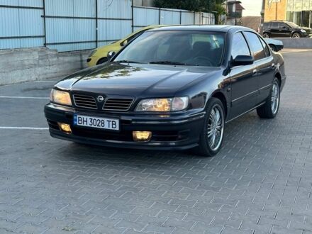 Фиолетовый Ниссан Максима, объемом двигателя 2 л и пробегом 234 тыс. км за 2500 $, фото 1 на Automoto.ua