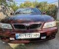 Красный Ниссан Максима, объемом двигателя 2 л и пробегом 361 тыс. км за 3996 $, фото 1 на Automoto.ua