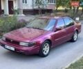 Красный Ниссан Максима, объемом двигателя 3 л и пробегом 250 тыс. км за 1500 $, фото 1 на Automoto.ua