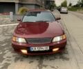 Красный Ниссан Максима, объемом двигателя 2.99 л и пробегом 300 тыс. км за 1850 $, фото 1 на Automoto.ua