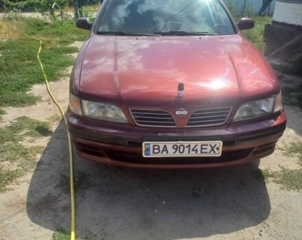 Красный Ниссан Максима, объемом двигателя 2 л и пробегом 270 тыс. км за 1800 $, фото 1 на Automoto.ua