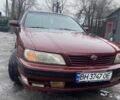 Красный Ниссан Максима, объемом двигателя 2 л и пробегом 238 тыс. км за 2200 $, фото 1 на Automoto.ua