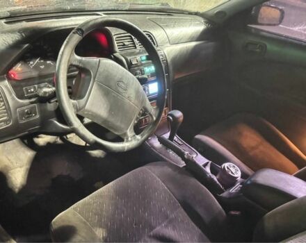 Червоний Ніссан Максіма, об'ємом двигуна 3 л та пробігом 378 тис. км за 1650 $, фото 5 на Automoto.ua