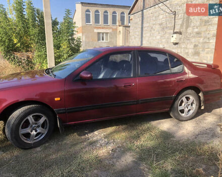 Красный Ниссан Максима, объемом двигателя 2 л и пробегом 231 тыс. км за 2800 $, фото 5 на Automoto.ua