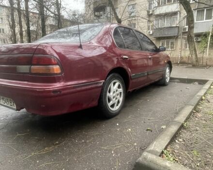 Червоний Ніссан Максіма, об'ємом двигуна 3 л та пробігом 378 тис. км за 1650 $, фото 4 на Automoto.ua