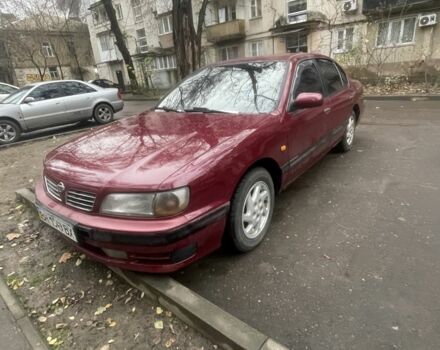 Червоний Ніссан Максіма, об'ємом двигуна 3 л та пробігом 378 тис. км за 1650 $, фото 1 на Automoto.ua