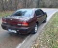 Ниссан Максима 1997 в Прилуках на Automoto.ua Красный Ниссан Максима, объемом двигателя 2 л и пробегом 450 тыс. км за 3400 $, фото 2 на Automoto.ua