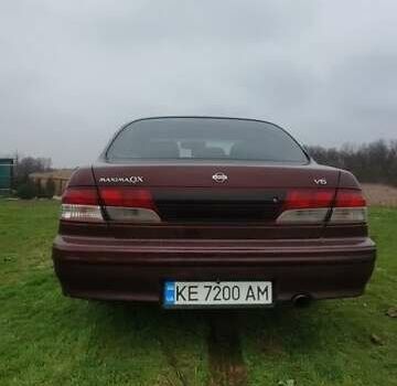 Червоний Ніссан Максіма, об'ємом двигуна 2 л та пробігом 390 тис. км за 2500 $, фото 2 на Automoto.ua