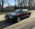 Красный Ниссан Максима, объемом двигателя 2 л и пробегом 284 тыс. км за 1800 $, фото 1 на Automoto.ua