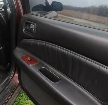 Червоний Ніссан Максіма, об'ємом двигуна 2 л та пробігом 390 тис. км за 2500 $, фото 10 на Automoto.ua