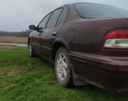 Червоний Ніссан Максіма, об'ємом двигуна 2 л та пробігом 390 тис. км за 2500 $, фото 2 на Automoto.ua