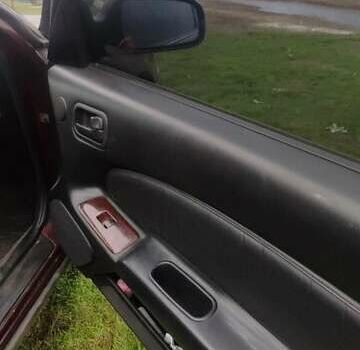 Червоний Ніссан Максіма, об'ємом двигуна 2 л та пробігом 390 тис. км за 2500 $, фото 11 на Automoto.ua