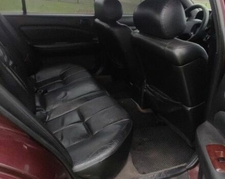 Червоний Ніссан Максіма, об'ємом двигуна 2 л та пробігом 390 тис. км за 2500 $, фото 7 на Automoto.ua